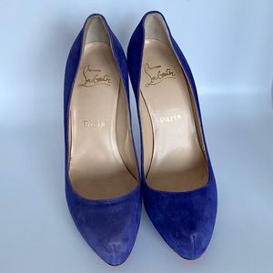 Christian Louboutin Suede Purple Pumps.